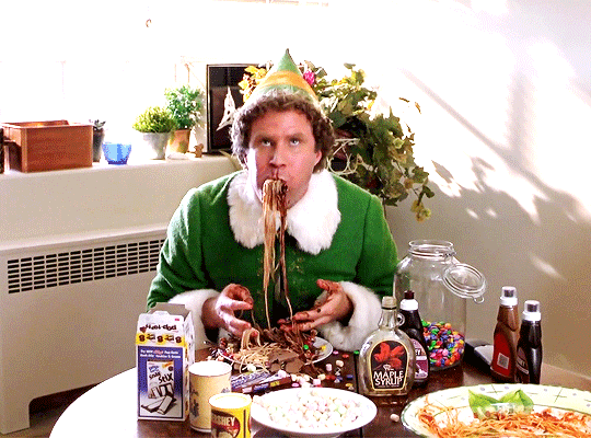 buddy the elf eating a ton of sweets